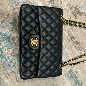 CHANEL
Classic Medium Double Flap Quilted Leather Shoulder Bag Black